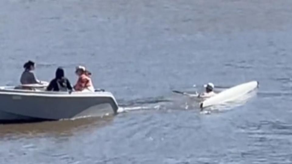 The rower is then swept down river while clinging on to the vessel. Picture: Supplied