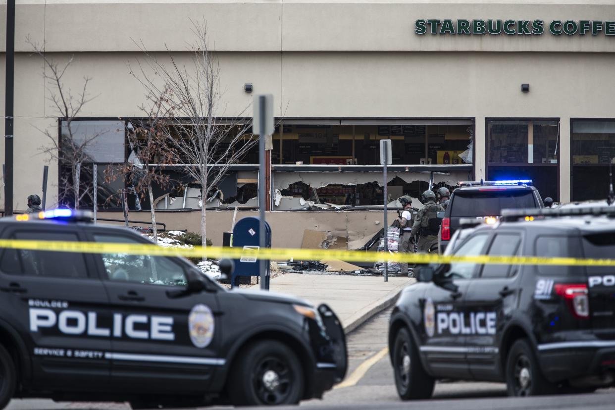 Shattered windows are shown at a King Soopers grocery store after a shooting on March 22, 2021 in Boulder, Colorado.