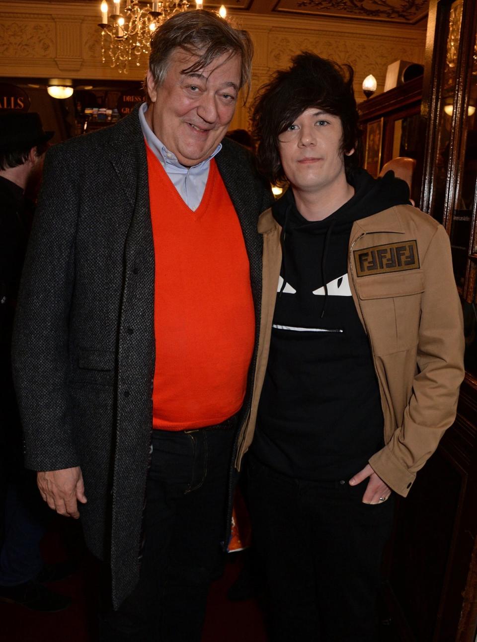 Fry with husband Elliott Spencer (right) who is 30 years his junior (Dave Benett/Getty Images)