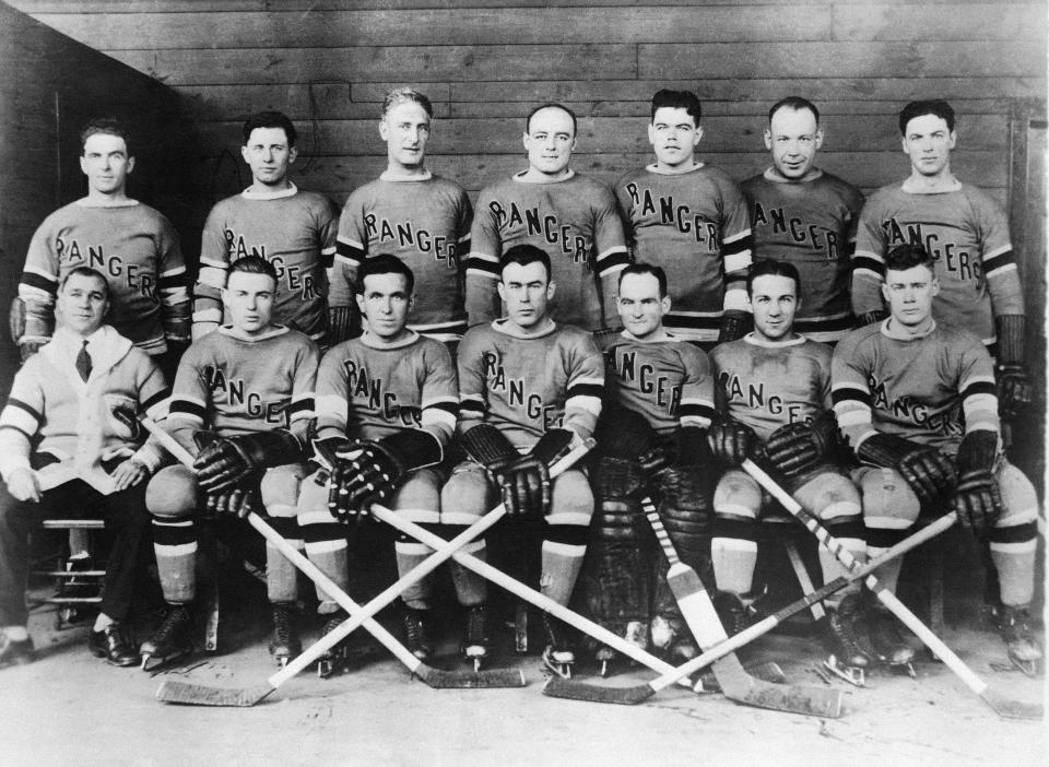 FILE - The New York Rangers, members of the National Hockey League, pose for a photo in 1928 in New York. From left to right, top row: Billy Boyd, Butch Keeling, manager Lester Patrick, Ching Johnson, Myles Lane, Taffy Abel and Paul Thompson. From left to right, bottom row: trainer Harry Westerby, Murray Murdock, Frank Boucher, Bill Cook, John Ross, Leo Bourgault and Bunny Cook. Abel was one of the first known Native American players in the NHL. (AP Photo/File)