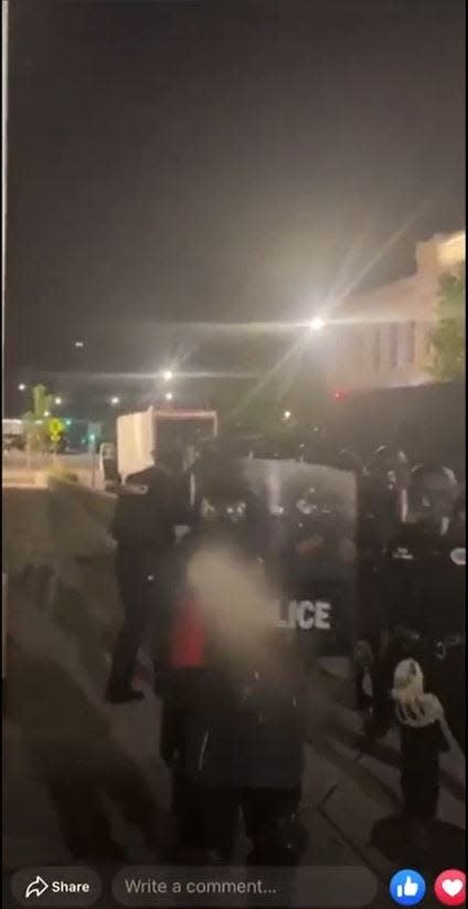 his screenshot from a Facebook Live video shows the moment May 30, 2020, then-Des Moines police Officer Daniel Dempsey fired pepper spray at Essence Welch. A federal jury has ruled that Dempsey violated Welch's First Amendment rights.