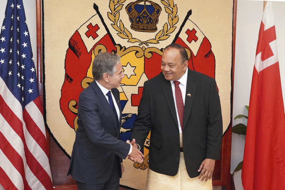 U.S. Secretary of State Antony Blinken, left, shakes hands with Tonga's Prime Minister Tonga's Prime Minister Siaosi Sovaleni in Nuku'alofa, Tonga Wednesday, July 26, 2023. (Tupou Vaipulu/Pool Photo via AP)