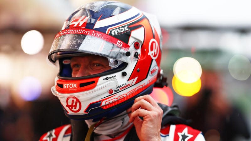 Pole position qualifier Kevin Magnussen of Denmark and Haas F1 walks into parc ferme during qualifying ahead of the F1 Grand Prix of Brazil at Autodromo Jose Carlos Pace on November 11, 2022 in Sao Paulo, Brazil