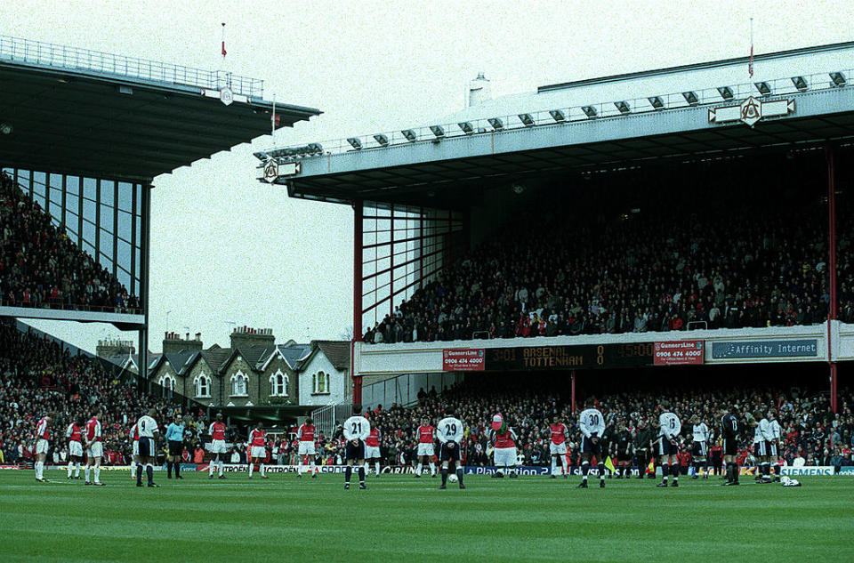 The Arsenal and Spurs teams observe a minutes silence in memory of David Rocastle before the Arsenal v Tottenham Hotspur FA Carling Premiereship match at Highbury, London