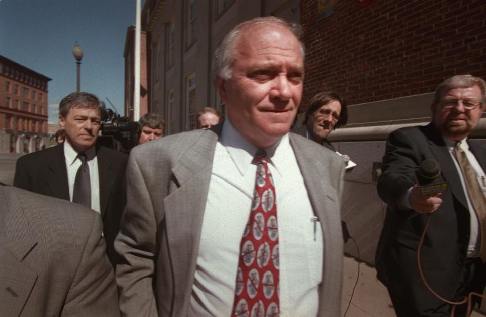 City tax collector Anthony E. Annarino Jr. leaves U.S. District Court in Providence after pleading guilty to felony charges of attempted extortion in connection with the Plunder Dome corruption investigation.