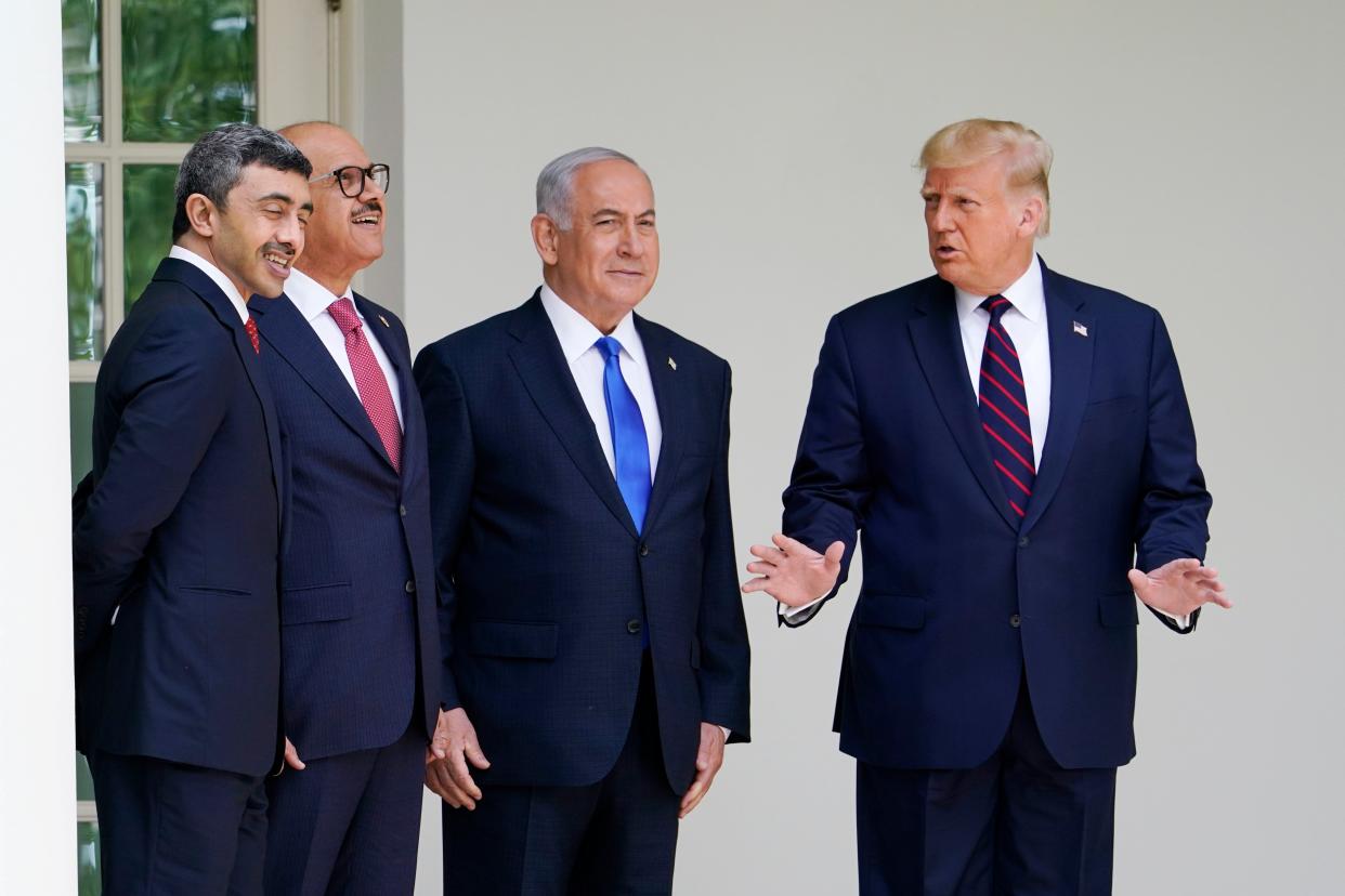Donald Trump (far right), Israeli Prime Minister Netanyahu, and the foreign ministers of Bahrain and UAE at the White House on Tuesday. (AP)