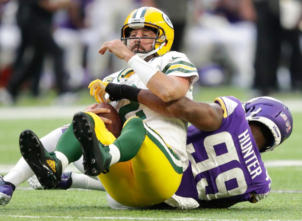 Aaron Rodgers gets sacked during the Packers' Week 1 loss.