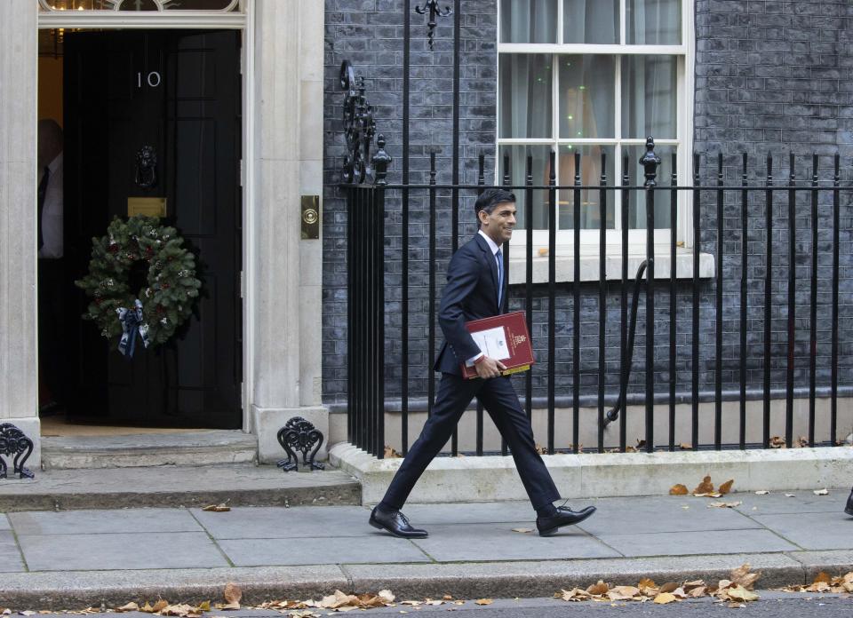 Britain's Prime Minister Rishi Sunak leaves 10 Downing Street in central London on December 7, 2022 on his way to take part in the weekly session of Prime Minister's Questions (PMQs) in the House of Commons.