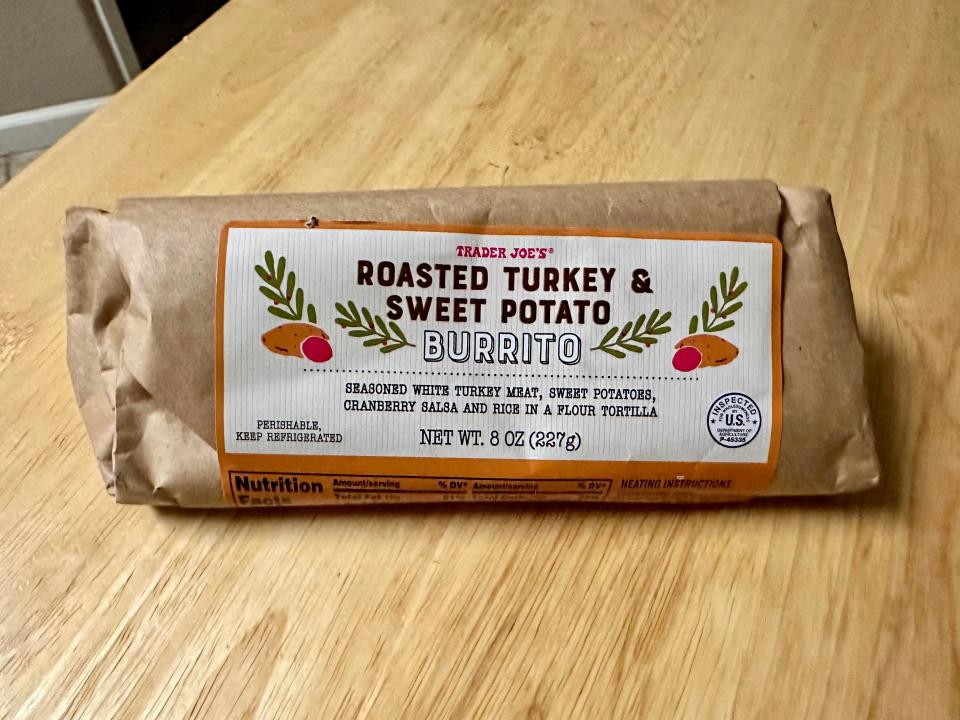 Trader Joe's sweet potato and turkey burrito in brown paper packaging