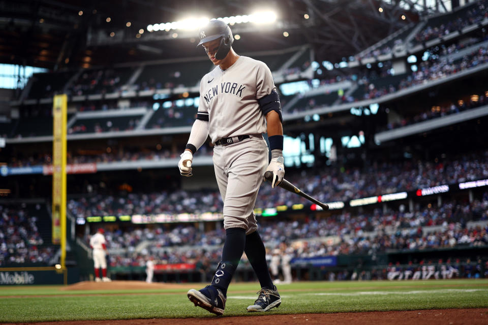 ARLINGTON, TEXAS - APRIL 27: Aaron Judge #99 of the New York Yankees reacts after striking out against the Texas Rangers in the top of the second inning at Globe Life Field on April 27, 2023 in Arlington, Texas. (Photo by Tom Pennington/Getty Images)