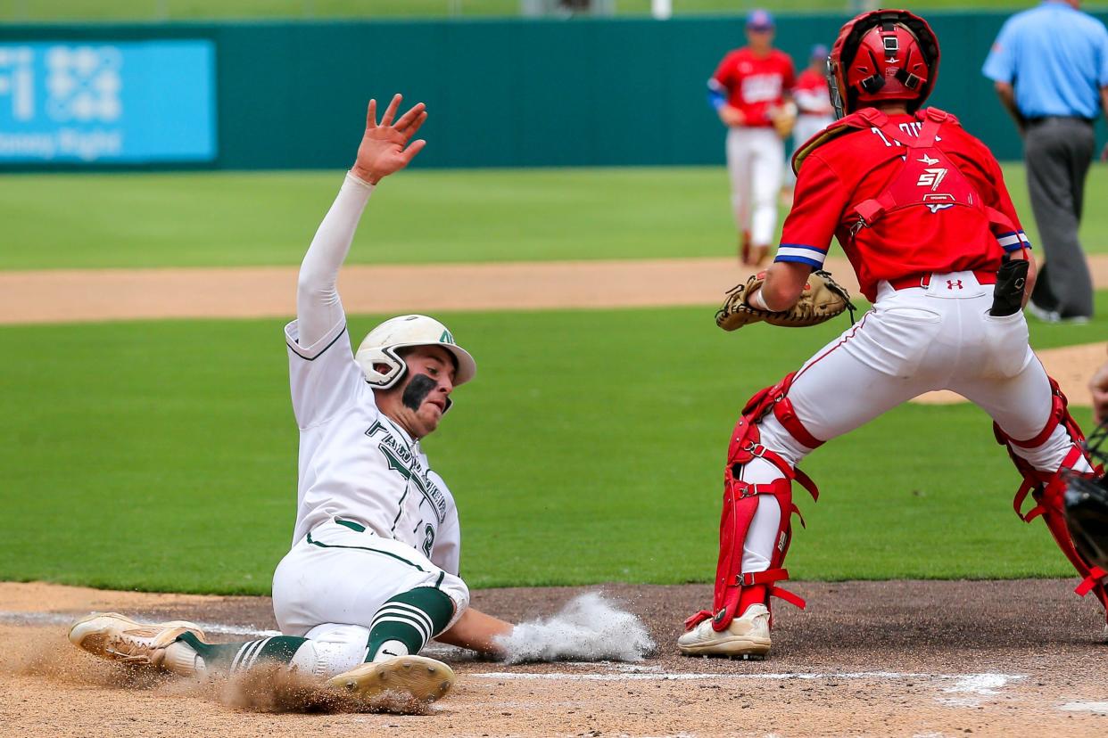 Amber-Pocasset’s Wyatt Hearrell (8) slides home during the OSSAA Class 2A Baseball State Championship Game between the Amber-Pocasset Panthers and the Silo Rebels at the Chickasaw Bricktown Ballpark in Oklahoma City, on Saturday, May 13, 2023.
