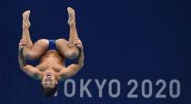 <p>Colombia's Daniel Restrepo Garcia competes in the men's 3m springboard diving semi-final event during the Tokyo 2020 Olympic Games at the Tokyo Aquatics Centre in Tokyo on August 3, 2021. (Photo by Attila KISBENEDEK / AFP)</p> 