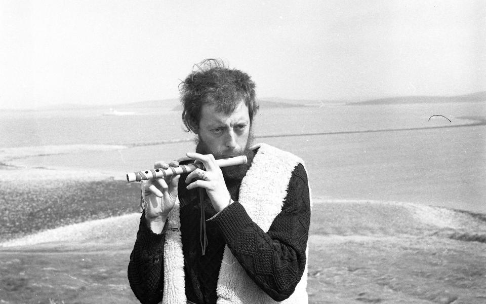 'King of the Hippies': Sid Rawle playing on his handmade flute