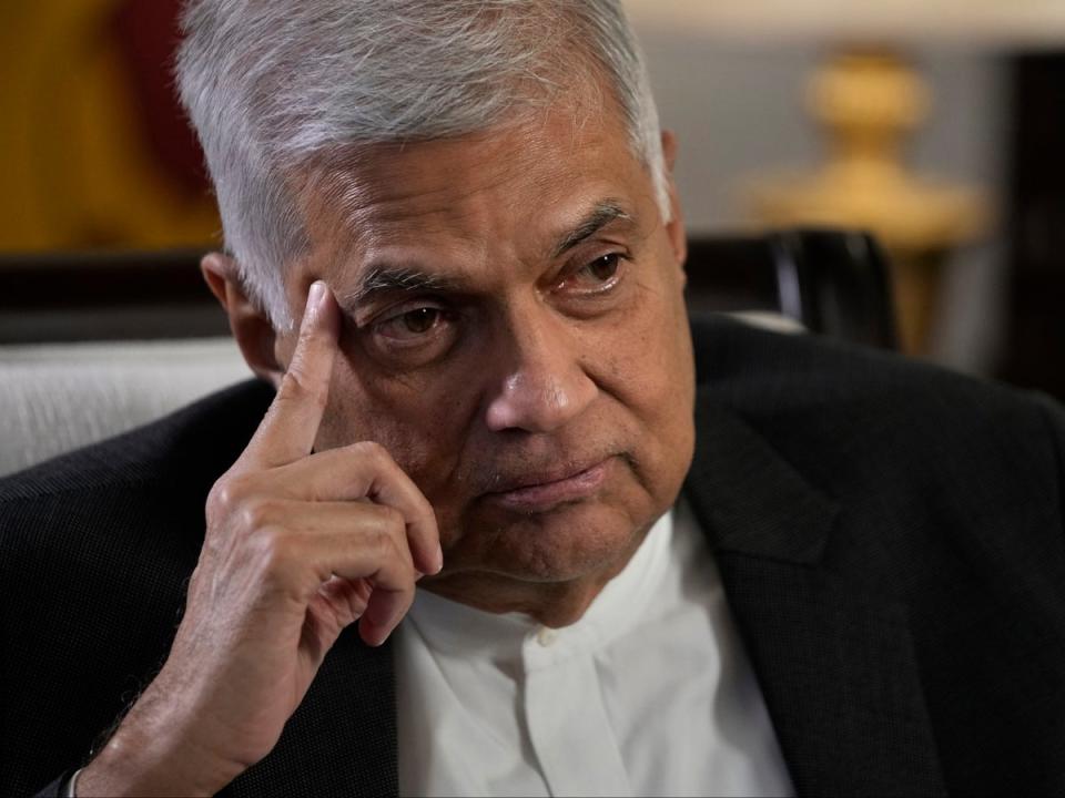 Ranil Wickremesinghe has agreed to step down as Sri Lanka’s prime minister (AP)