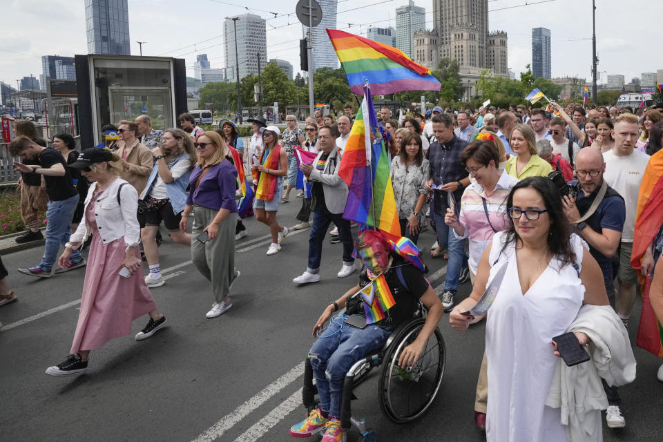 People take part in the Equality Parade, an LGBT pride parade, in Warsaw, Poland, Saturday, June 17, 2023. (AP Photo/Czarek Sokolowski)