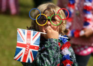 LONDON, ENGLAND - JULY 29: A young fan watches on during the Women's Road Race Road Cycling on day two of the London 2012 Olympic Games on July 29, 2012 in London, England (Photo by Streeter Lecka/Getty Images)