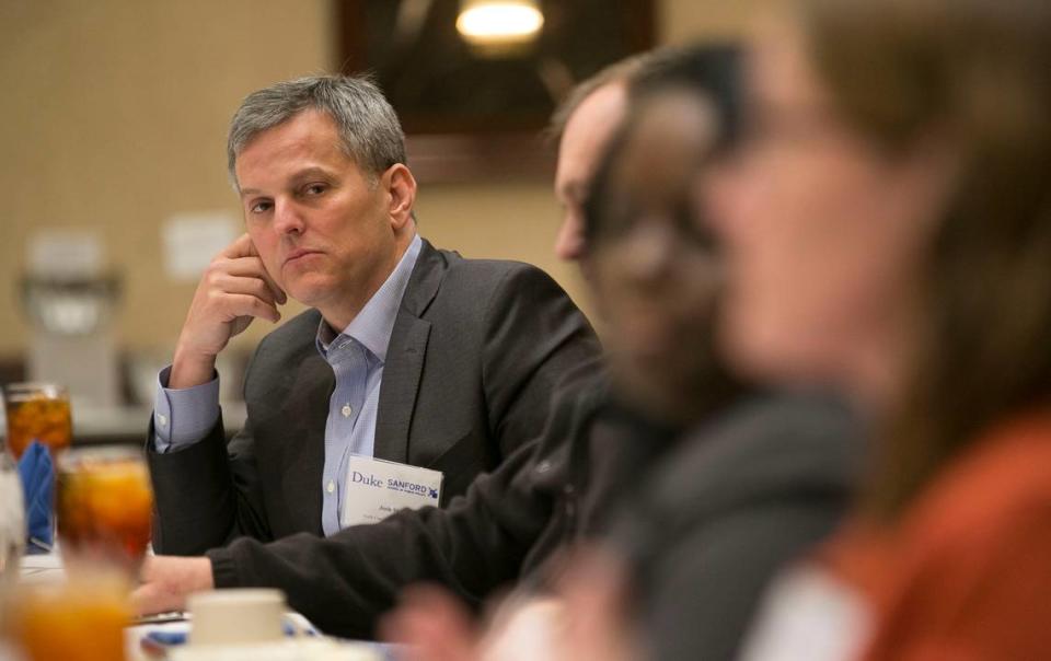 North Carolina Attorney General Josh Stein listens to Duke scientist Katie Rosanbalm during a roundtable discussion on the opioid crisis hosted by Duke in 2018 at in Research Triangle Park.