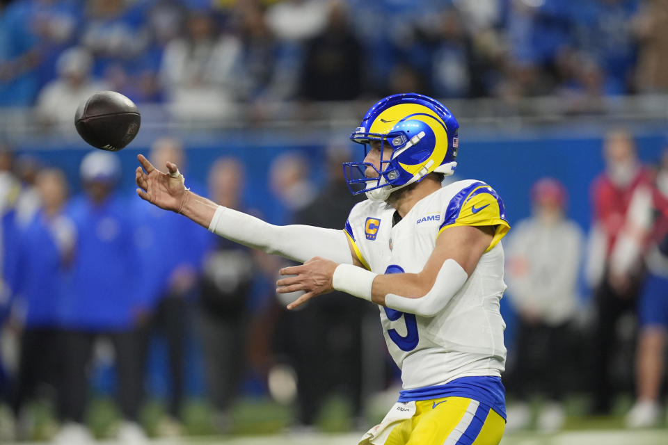 Los Angeles Rams quarterback Matthew Stafford throws during the second half of an NFL wild-card playoff football game against the Detroit Lions, Sunday, Jan. 14, 2024, in Detroit. (AP Photo/Paul Sancya)