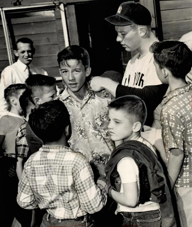 Merlyn Mantle and her four sons rehearse a song of congratulations to their  father and husband, Mickey Mantle of the New York Yankees on the 500th home  run of his career, May