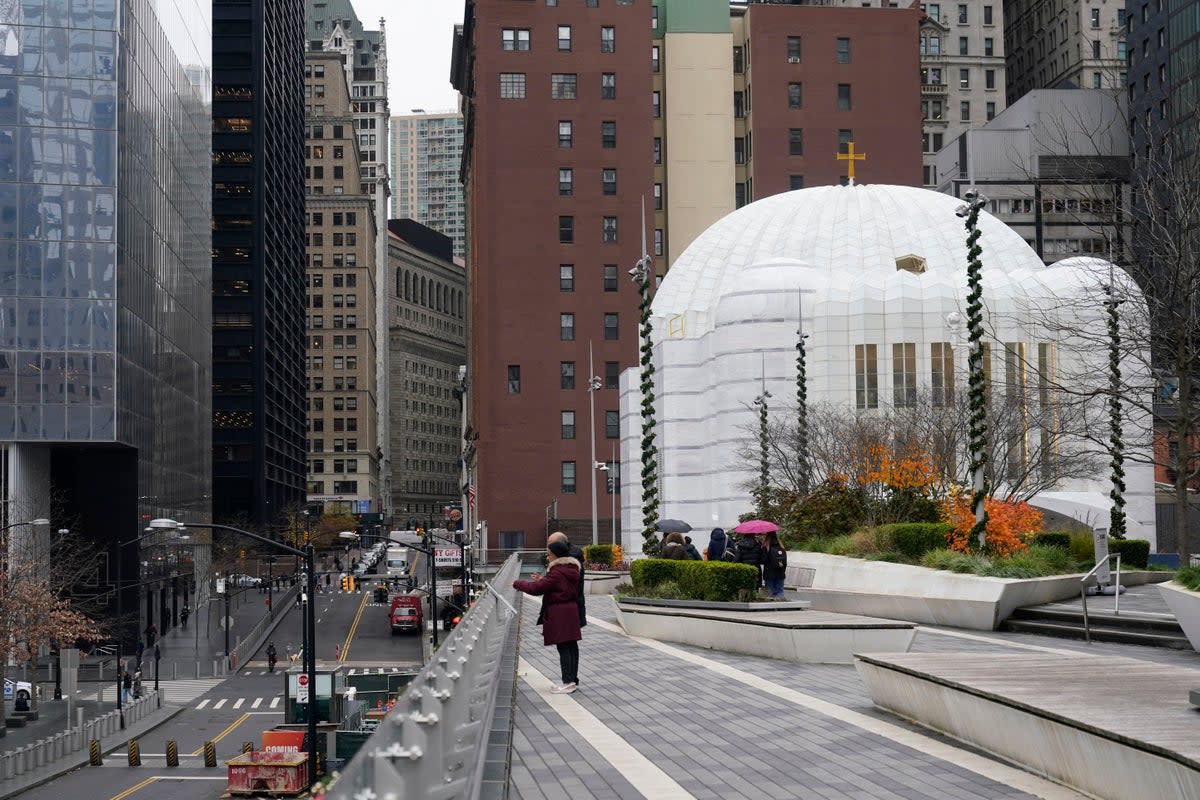 St Nicholas Greek Orthodox Church, right, sits next to Ground Zero in New York (AP)