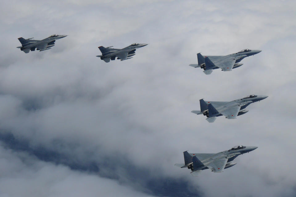 Japanese and U.S. joint fighter jets fly in formation over the Sea of Japan, Tuesday, June 7, 2022. Japanese and U.S. militaries conducted joint fighter jet flight drills over the Sea of Japan “amid increasingly severe security environment such as North Korea’s repeated ballistic missile firing,” Japan’s Defense Ministry announced Tuesday.(Joint Staff via AP)