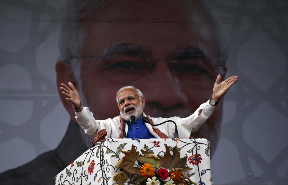 India's Prime Minister Narendra Modi addresses a rally in a cricket stadium in Srinagar, November 7, 2015. Modi pledged 800 billion rupees ($12.10 billion) in funds to bolster development and economic growth in Kashmir, a year after the worst flooding in more than a century destroyed half a million homes there. REUTERS/Danish Ismail      TPX IMAGES OF THE DAY     