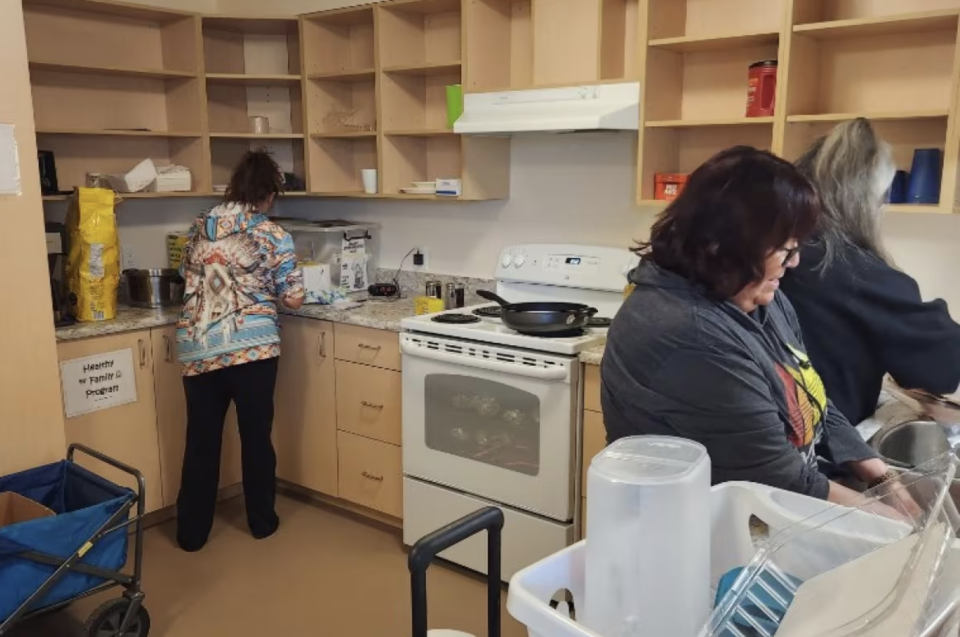 While in Fort Providence the sisters put on a community feast of salmon, rice and bannock. They said it was fun to cook together and work as a team. (Courtesy: CBC News)