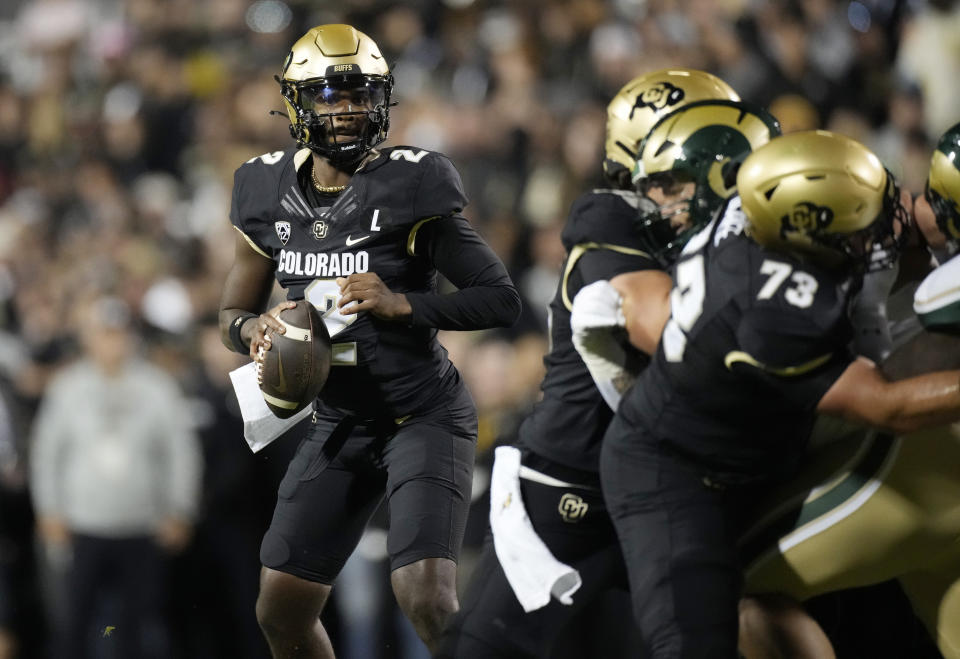 Colorado quarterback Shedeur Sanders (2) looks to pass the ball during the first half of an NCAA college football game against Colorado State, Saturday, Sept. 16, 2023, in Boulder, Colo. (AP Photo/David Zalubowski)