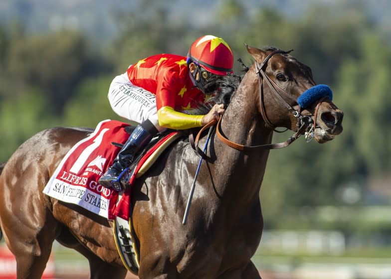 Life Is Good and jockey Mike Smith win the $300,000 San Felipe Stakes on March 6, 2021, at Santa Anita Park.