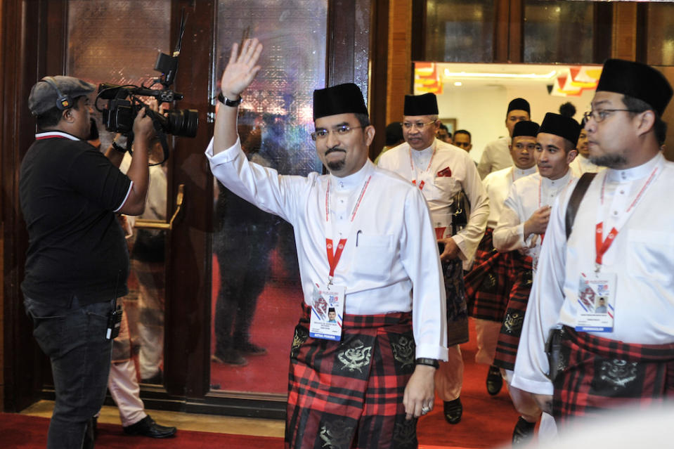 Umno Youth chief Datuk Asyraf Wajdi Dasuki arrives for the 2019 Umno General Assembly at the Putra World Trade Centre in Kuala Lumpur, December 5, 2019. — Picture by Shafwan Zaidon