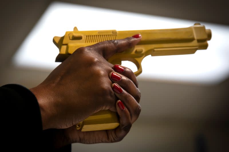 Andreyah Garland, a 44-year-old single mother of three daughters during a gun training session in Newburgh