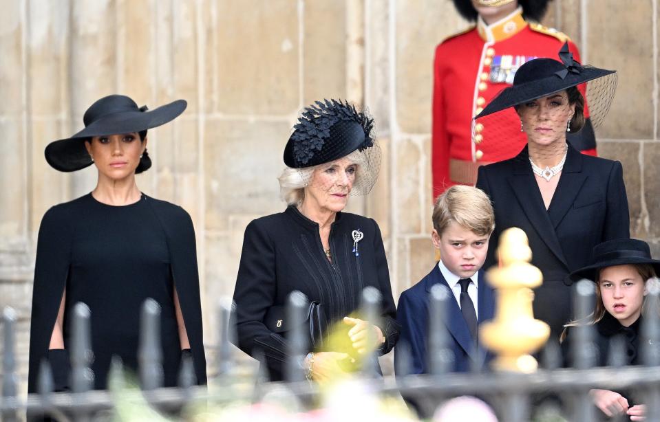 Meghan, Duchess of Sussex, Camilla, Queen Consort, Prince George of Wales, Catherine, Princess of Wales, Princess Charlotte of Wales during the State Funeral of Queen Elizabeth II at Westminster Abbey on September 19, 2022 in London, England. Elizabeth Alexandra Mary Windsor was born in Bruton Street, Mayfair, London on 21 April 1926. She married Prince Philip in 1947 and ascended the throne of the United Kingdom and Commonwealth on 6 February 1952 after the death of her Father, King George VI. Queen Elizabeth II died at Balmoral Castle in Scotland on September 8, 2022, and is succeeded by her eldest son, King Charles III.