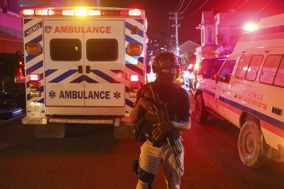 Police guard outside the hospital where Haiti's newly selected prime minister, Garry Conille was hospitalized in Port-au-Prince, Haiti late Saturday, June 8, 2024. Louis Gérald Gilles, a member of the transitional presidential council that recently chose Conille, said he was en route to the hospital and did not have further information. (AP Photo/Odelyn Joseph)