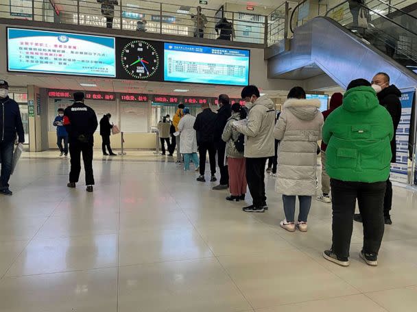 PHOTO: Visitors line up at the cash counters in Baoding No. 2 Central Hospital in Zhuozhou city in northern China's Hebei province on Dec. 21, 2022. (AP)