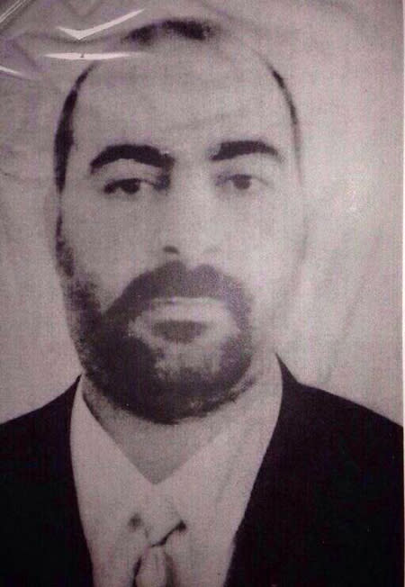 FILE - Undated file picture released on Wednesday Jan. 29, 2014, by the official website of Iraq's Interior Ministry claiming to show Abu Bakr al-Baghdadi, the head of the so-called Islamic State of Iraq and the Levant. Al-Qaida's central leadership broke with one of its most powerful branch commanders, who in defiance of its orders spread his operations from Iraq to join the fighting in Syria and fueled bitter infighting among Islamic militant factions in Syria’s civil war. The announcement sharpens a dispute raging the past year between al-Qaida’s central leadership and the faction known as the Islamic State of Iraq and the Levant, which was created last year by, Al-Baghdadi. He formed the group to expand his operations into neighboring Syria in defiance of direct orders by Ayman al-Zawahri not to do so and to stick to operations within Iraq. (AP Photo/Iraqi Interior Ministry, File)