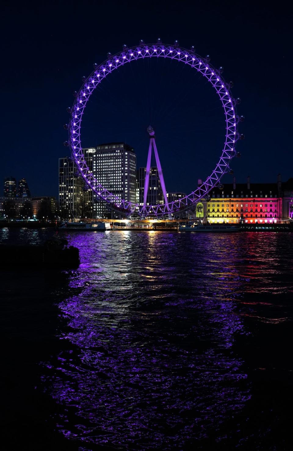 The London Eye lit up in purple for Holocaust Memorial Day (Ian West/PA) (PA Wire)