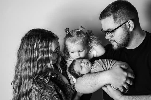 <p>Courtesy of Kaylee and Landon Doss</p> Kaylee and Landon Doss with daughter Rowan and son Reese