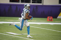 Carolina Panthers safety Jeremy Chinn returns a fumble 28-yards for a touchdown during the second half of an NFL football game against the Minnesota Vikings, Sunday, Nov. 29, 2020, in Minneapolis. (AP Photo/Bruce Kluckhohn)