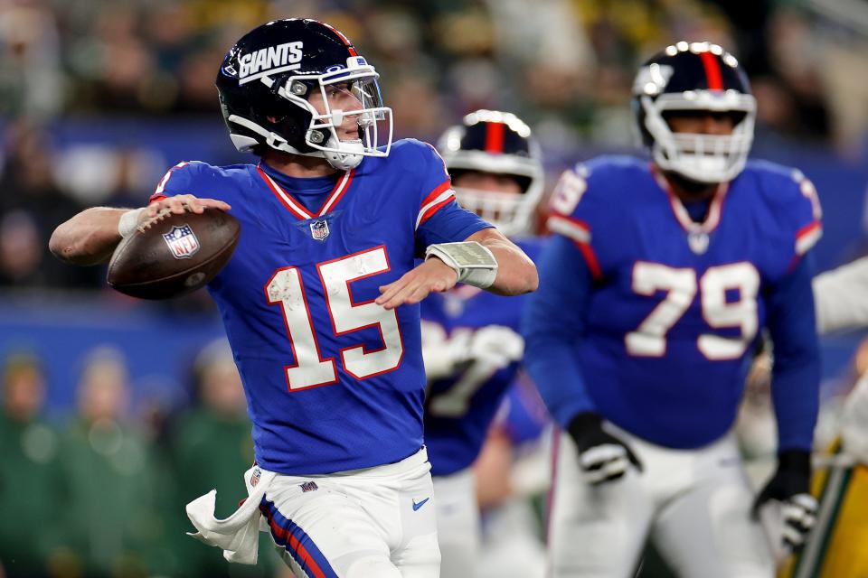 New York Giants quarterback Tommy DeVito (15) passes against the Green Bay Packers during the fourth quarter of an NFL football game, Monday, Dec. 11, 2023, in East Rutherford, N.J. (AP Photo/Adam Hunger)