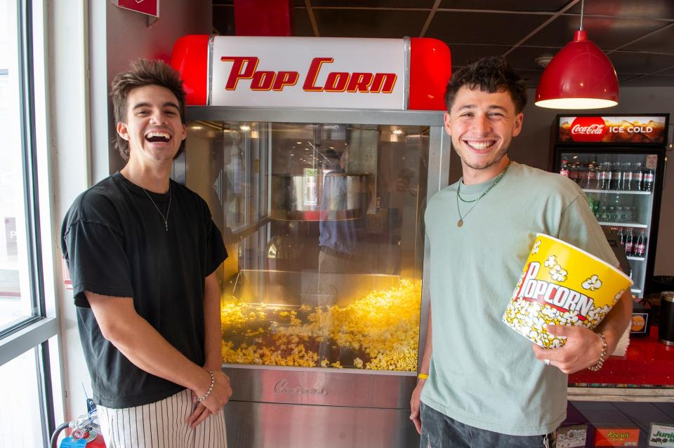 Caleb Spilios, left, and Ethan Charles, pictured in the Maynard Fine Arts Theatre, Aug. 5, 2022. Their new film, "Blood Moon," will premiere there at noon on Sunday.