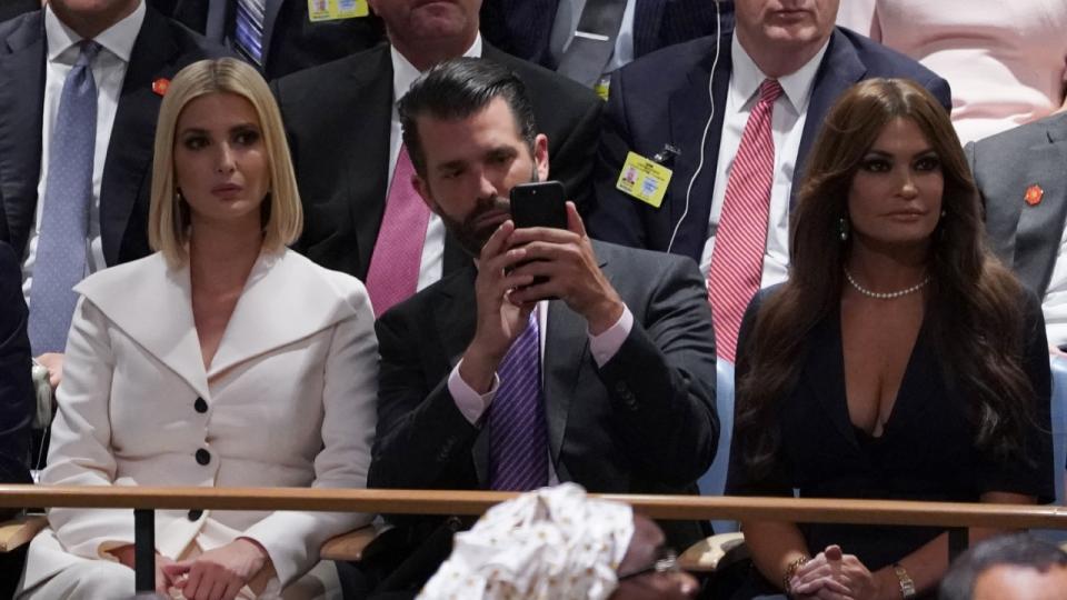 Ivanka Trump, Donald Trump. Jr. and Kimberly Guilfoyle. Photo by TIMOTHY A. CLARY / AFP.