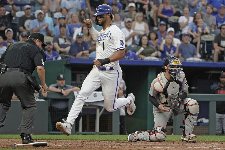 Kansas City Royals' MJ Melendez (1) runs past Detroit Tigers catcher Eric Haase to score on a single by Freddy Fermin during the fourth inning of a baseball game against the Detroit Tigers Monday, July 17, 2023, in Kansas City, Mo. (AP Photo/Charlie Riedel)