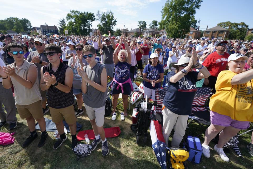 FILE - A crowd cheers as Jim Caviezel speaks during a "rosary rally" on Sunday, Aug. 6, 2023, in Norwood, Ohio. As the campaigning for and against the nation’s latest tug-of-war over abortion begins in earnest this weekend, Ohio voters are getting a different message from the measure’s opponents. (AP Photo/Darron Cummings, File)