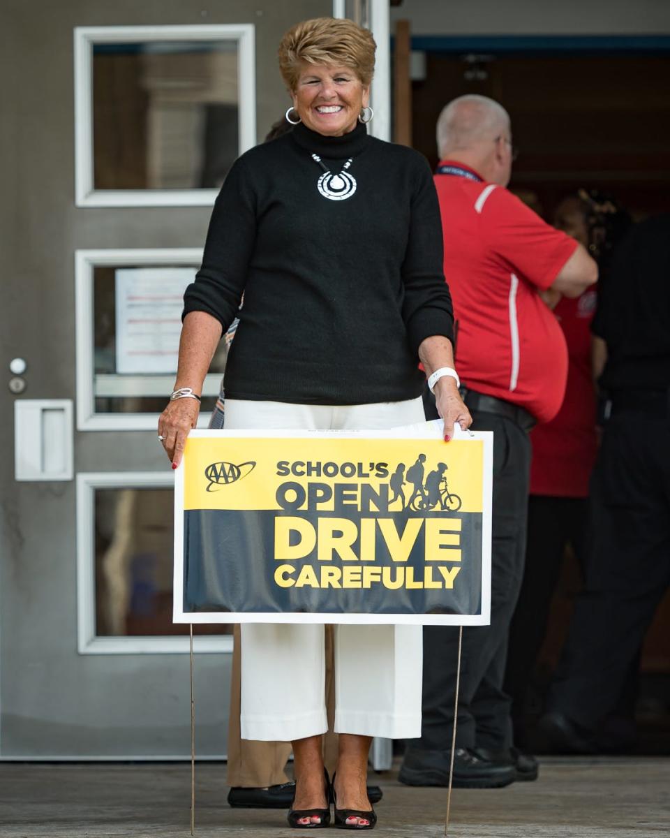 Regional Director Public Affairs at AAA Northeast, Patti Artessa, stands in front of Watson Williams Elementary School in Utica, NY on Friday, September 8, 2023 for the launch of the annual "School's Open, Drive Carefully Campaign", reminding drivers to be extra careful behind the wheel as children end their summer vacations and head back to school.