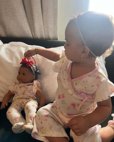 <p>Priyanka Chopra/Instagram</p> Malti Marie, 19 months, playing with a baby doll