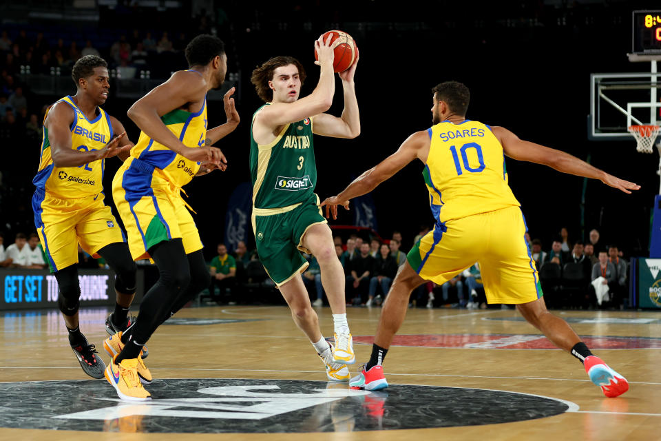 MELBOURNE, AUSTRALIA – AUGUST 16: Josh Giddey of Australia takes possession of the ball during the match between the Australia Boomers and Brazil at Rod Laver Arena on August 16, 2023 in Melbourne, Australia. (Photo by Graham Denholm/Getty Images)