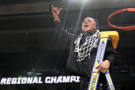 South Carolina head coach Dawn Staley celebrates after cutting down the net after defeating Oregon State in an Elite Eight round college basketball game during the NCAA Tournament, Sunday, March 31, 2024, in Albany, N.Y. (AP Photo/Mary Altaffer)