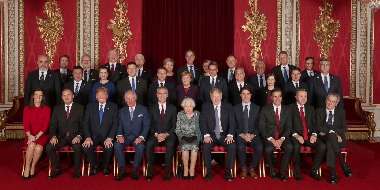 Leaders of the NATO alliance countries, and its secretary general, join Britain's Queen Elizabeth II and Prince Charles the Prince of Wales, for a group picture during a reception at Buckingham Palace in London, Tuesday Dec. 3, 2019, as they gathered to mark 70-years of the alliance. Back row, from left: Xavier Bettel Prime Minister of Luxembourg; Egils Levits President of Latvia; Gitanas Nauseda President of Lithuania; Dusko Markovic Prime Minister of Montenegro; Erna Solberg Prime Minister of Norway; Mark Rutte Prime Minister of Netherlands; Zuzana Caputova President of Slovakia; Andrzej Duda President of Poland; Antonio Costa Prime Minister of Portugal; Klaus Iohannis President of Romania; Marjan Sarec Prime Minister of Slovenia. Middle row from left: Edi Rama Prime Minister of Albania; Zoran Zaev Prime Minister of North Macedonia; Mette Frederiksen Prime Minister of Denmark; Juri Ratas Prime Minister of Estonia; Emmanuel Macron President of France; Angela Merkel President of Germany; Kyriakos Mitsotakis Prime Minister of Greece; Viktor Orban Prime Minister of Hungary; Katrin Jakobsdottir Prime Minister of Iceland; Giuseppe Conte Prime Minister of Italy; Andrej Plenkovic Prime Minister of Croatia. Seated from left: Sophie Wilmas Prime Minister of Belgium; Rumen Radev President of Bulgaria; Donald Trump President of United States; Prince Charles The Prince of Wales; Jens Stoltenberg NATO Secretary General; Queen Elizabeth II; Boris Johnson Prime Minister of the United Kingdom; Justin Trudeau Prime Minister of Canada; Pedro Sanchez Acting Prime Minister of Spain; Recep Tayyip Erdogan President of Turkey; Milos Zeman President of the Czech Republic. (Yui Mok/Pool via AP)