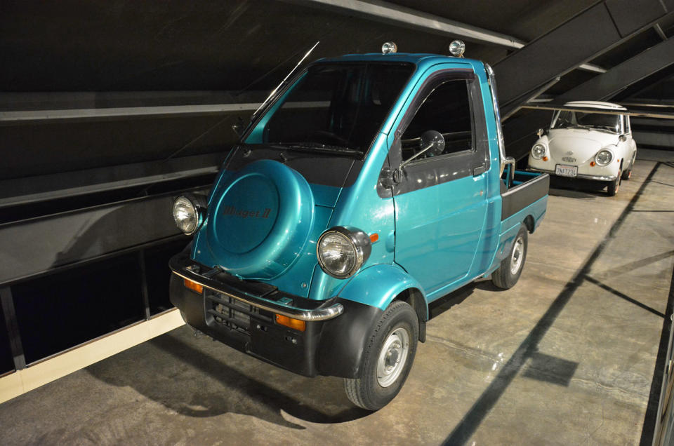 <p>The Daihatsu Midget II is small and narrow even by Japanese standards. Introduced in 1996 to compete in the kei car segment, it offered buyers a long list of options including one- and two-seater configurations, four-wheel drive and an automatic transmission. The driver sits right over the <strong>three-cylinder engine</strong>, a packaging solution that helped Daihatsu design a pickup that <strong>fits in the back of a Ford F-150</strong>.</p>