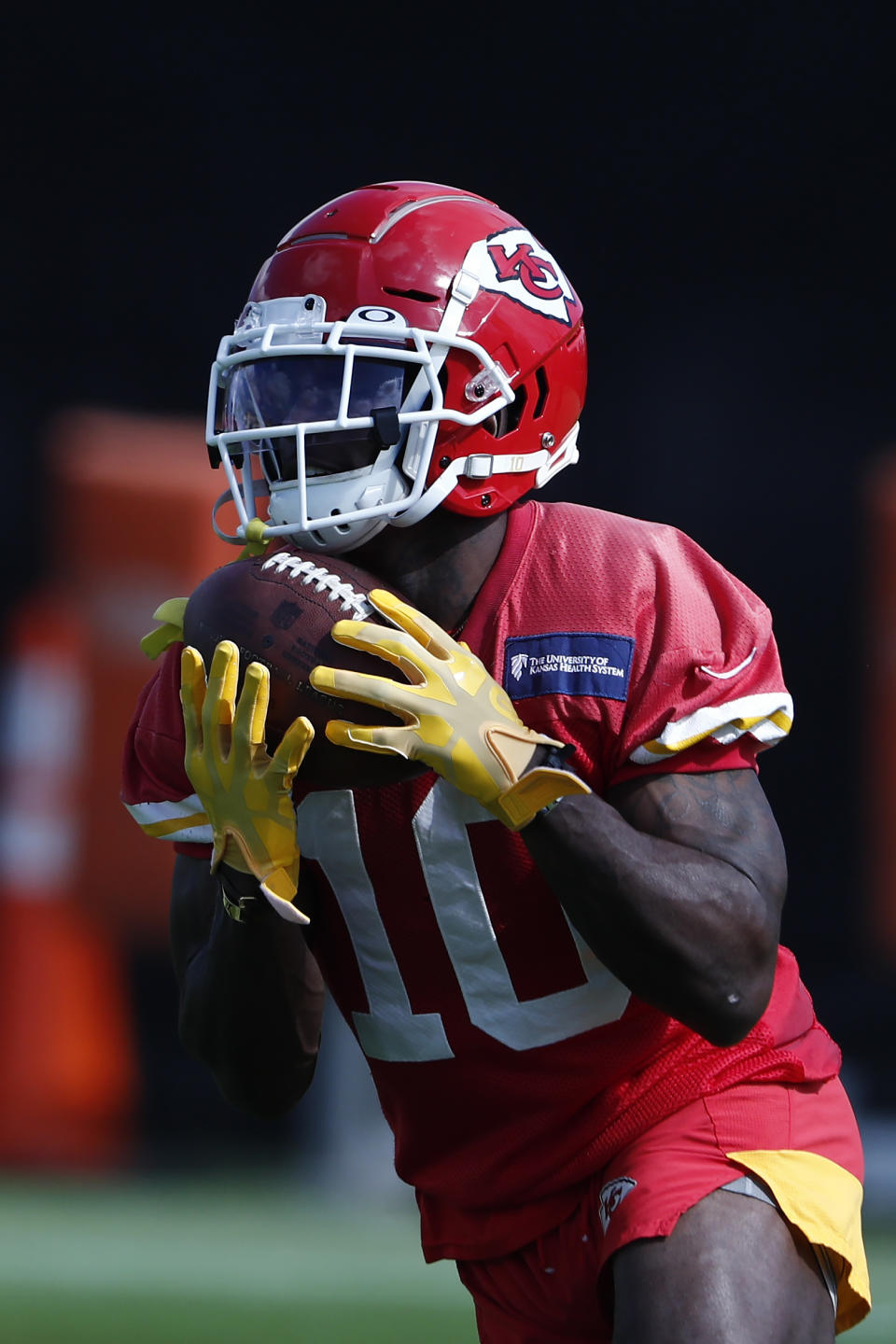 Kansas City Chiefs wide receiver Tyreek Hill (10) catches the ball during practice on Thursday, Jan. 30, 2020, in Davie, Fla., for the NFL Super Bowl 54 football game. (AP Photo/Brynn Anderson)